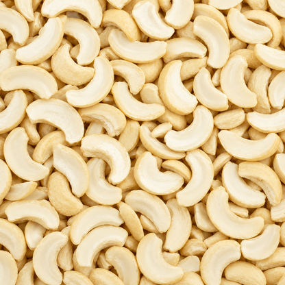Close-up of Vaaraahi Cashew Nut Pieces(2) showing natural half-cut cashew pieces