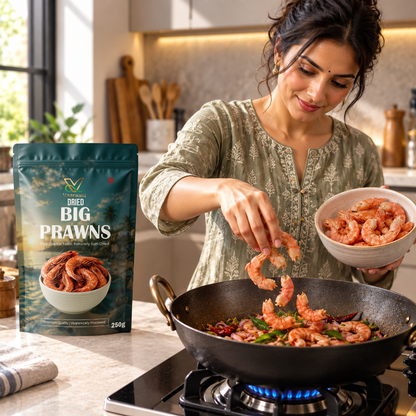 Cooking Vaaraahi Dried Big Prawns in a traditional Indian kitchen