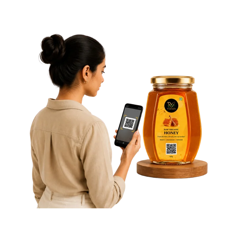 Customer scanning a QR code on a Vaaraahi honey jar to trace its product journey