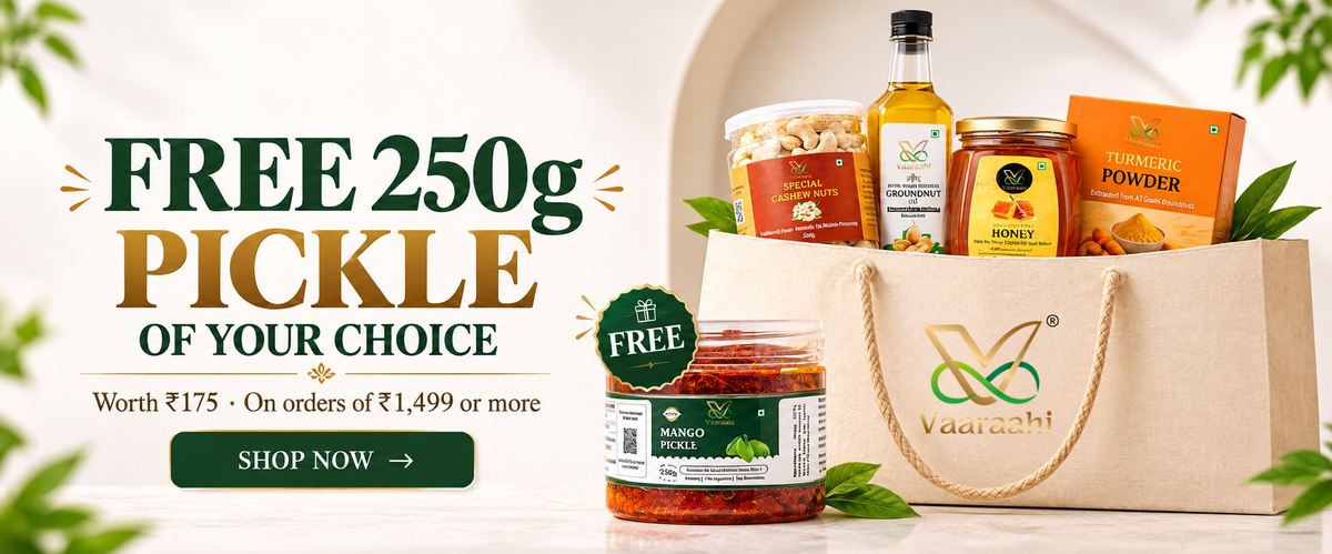 Vaaraahi Foods free 250g pickle offer on orders of ₹1,499 or more, featuring a Mango Pickle jar and a selection of Vaaraahi products.