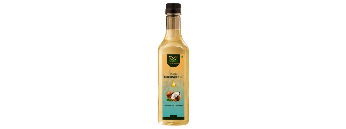 Vaaraahi Pure Coconut Oil in a 1 litre bottle with coconut imagery on the label, described as preservative free and truly natural.