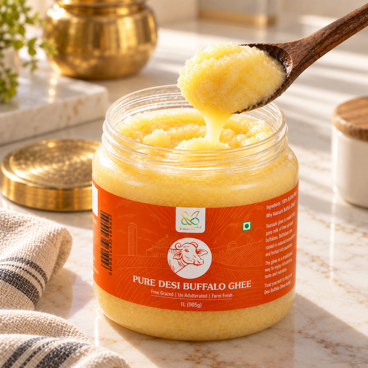 Vaaraahi Pure Desi Buffalo Ghee texture with a spoon