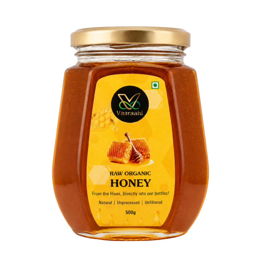 Vaaraahi Raw Organic Honey in a 500g glass jar, labelled natural, unprocessed and unfiltered.