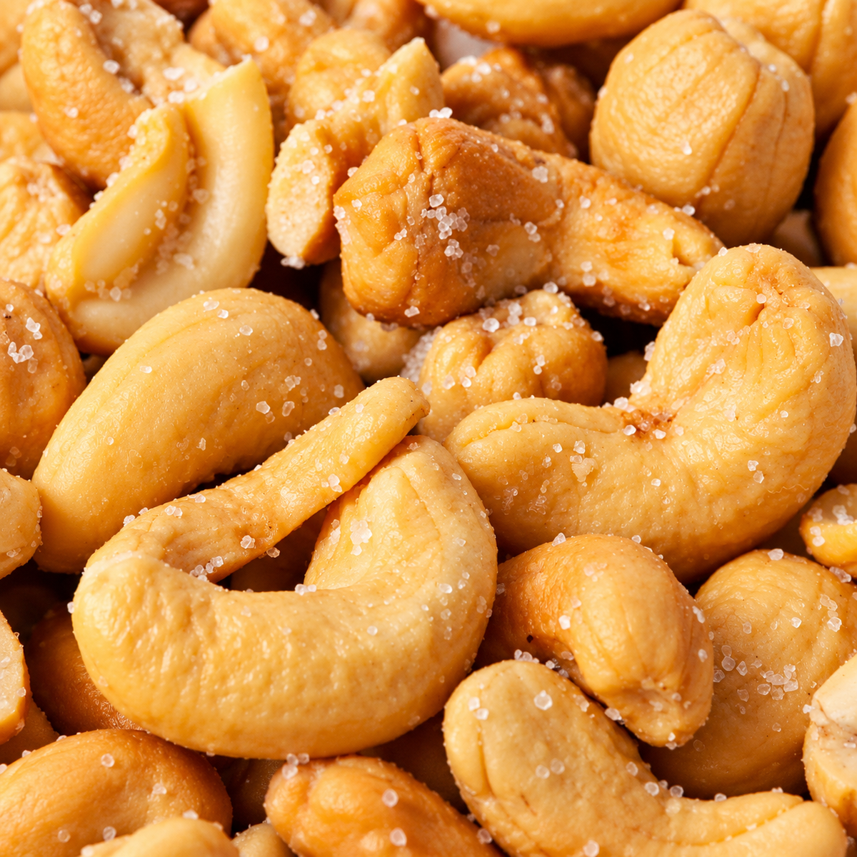 Close-up of Vaaraahi Roasted & Salted Cashew Nuts with visible salt crystals