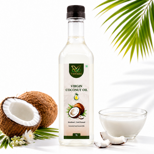 Vaaraahi Virgin Coconut Oil bottle with fresh coconuts and coconut milk